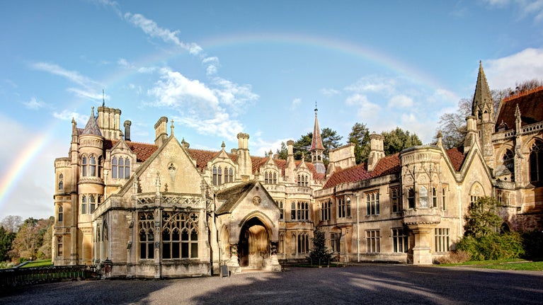 Rainbow across the Victorian revival house at Tyntesfield, Somerset - exterior